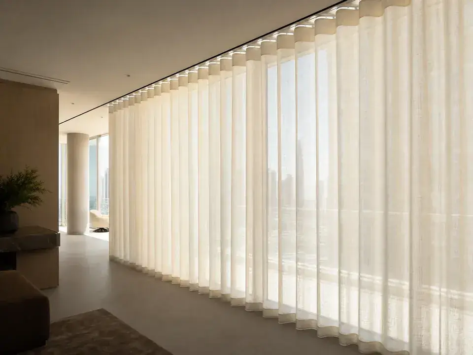 Full-height wave sheer curtains with even folds
