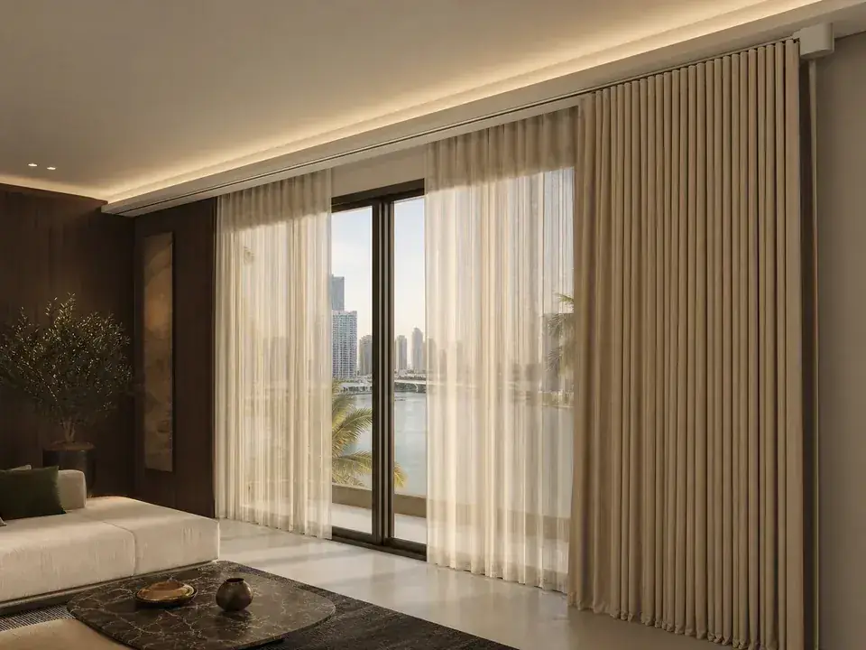 Motorized full-height curtains on a discreet ceiling track