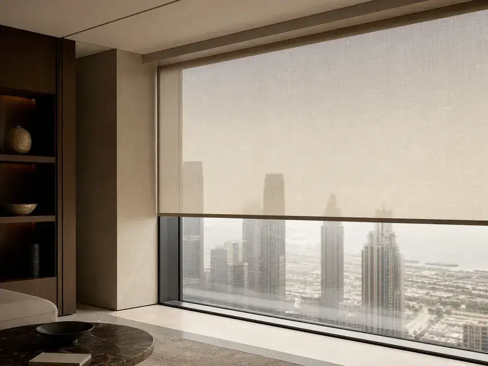 Motorized roller blind on tall contemporary glazing