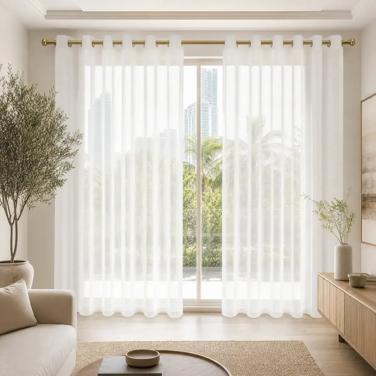 White sheer eyelet curtains filtering daylight in a modern Dubai apartment